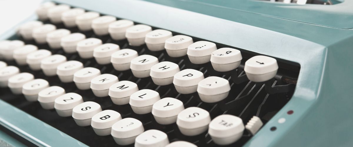 Image of a blue typewriter |Sarah Richards Social