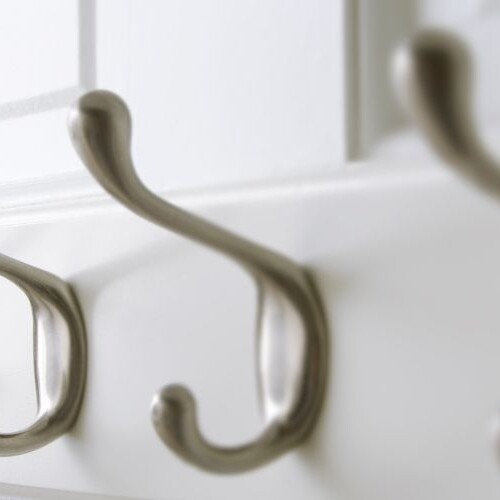 Image of a line of coat hooks as a simile for marketing hooks